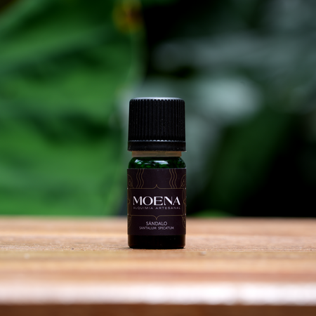 Small bottle of Australian Sandalwood Essential Oil on wooden table